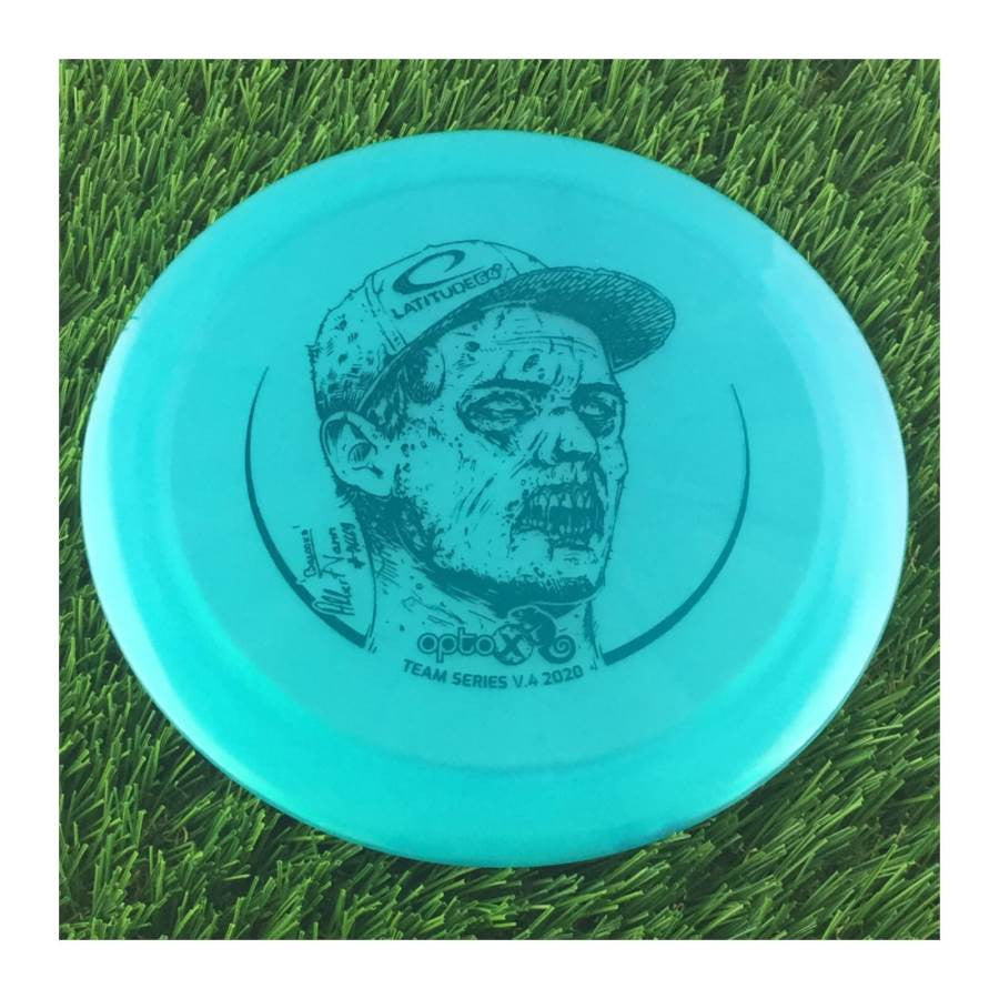 Latitude 64 Opto-X Chameleon Moonshine Recoil Distance Driver with Albert Tamm 2020 Team Series Volume 4 Zombie Edition Stamp - Speed 12
