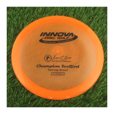 Innova Champion Teebird with Ken Climo 12x World Champion Stamp - 175g - Translucent Orange