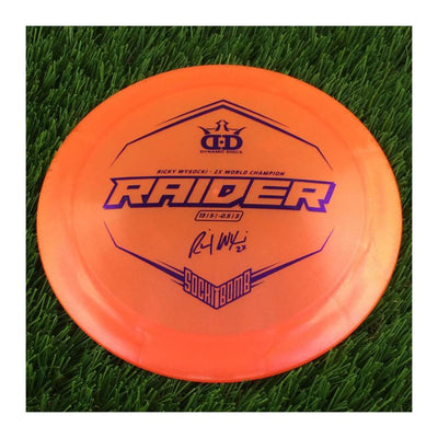 Dynamic Discs Lucid Ice Glimmer Raider with Ricky Wysocki - 2X World Champion - SockiBomb Stamp - 175g - Translucent Orange