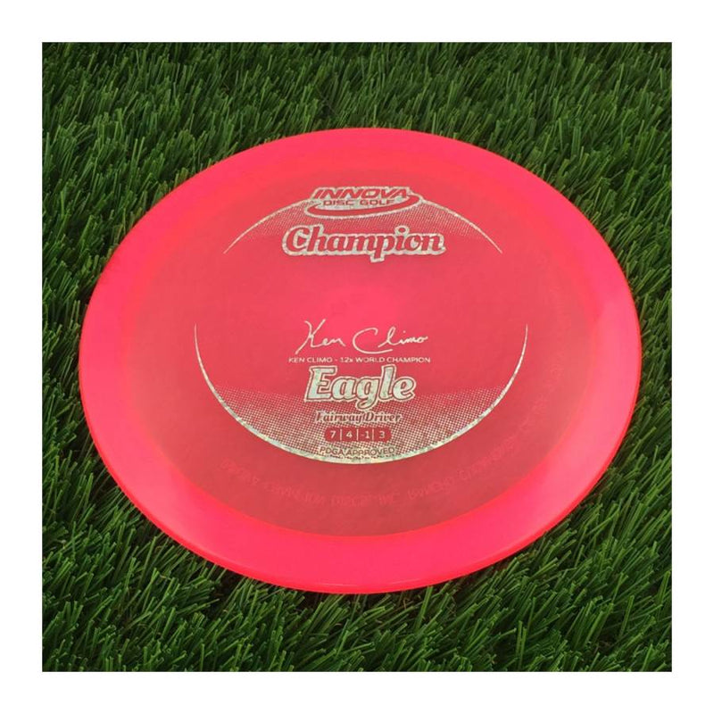 Innova Champion Eagle with Ken Climo - 12x World Champion New Stamp Stamp - 170g - Translucent Pink