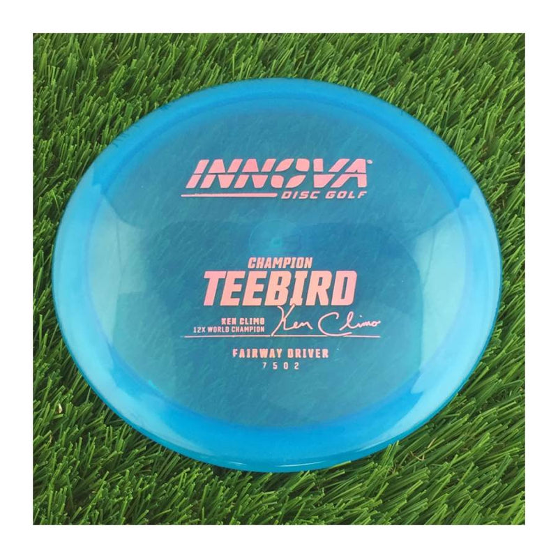 Innova Champion Teebird with Ken Climo 12x World Champion Burst Logo Stamp - 172g - Translucent Blue