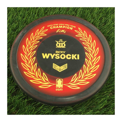 Dynamic Discs Classic Supreme Raptor Eye SockiBomb Slammer with 2022 Disc Golf Pro Tour Champion Ricky Wysocki Sockibomb Stamp - 175g - Solid Red