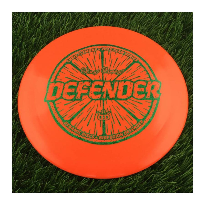 Dynamic Discs BioFuzion Defender with Chris Clemons Lemon Seeds Team Series 2023 Stamp - 173g - Solid Orange