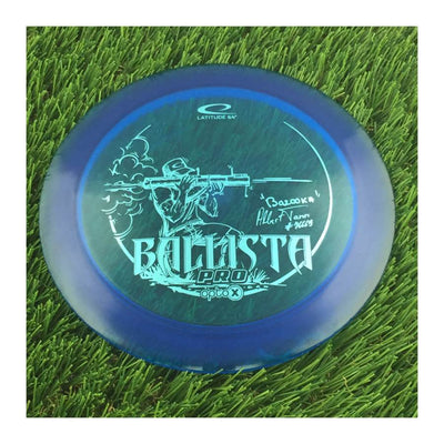 Latitude 64 Opto-X Ballista Pro with Albert Bazooka Tamm #76669 2022 Team Series Stamp - 174g - Translucent Blue