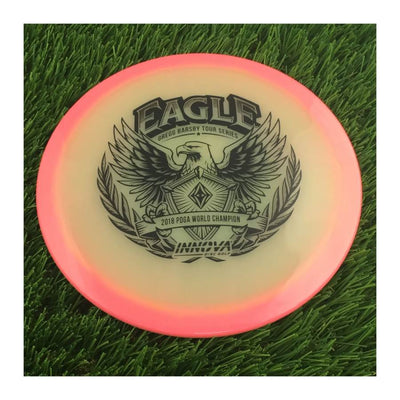 Innova Proto Glow Halo Champion Eagle with Gregg Barsby - 2018 World Champion -  Tour Series 2024 Stamp - 175g - Translucent Pink