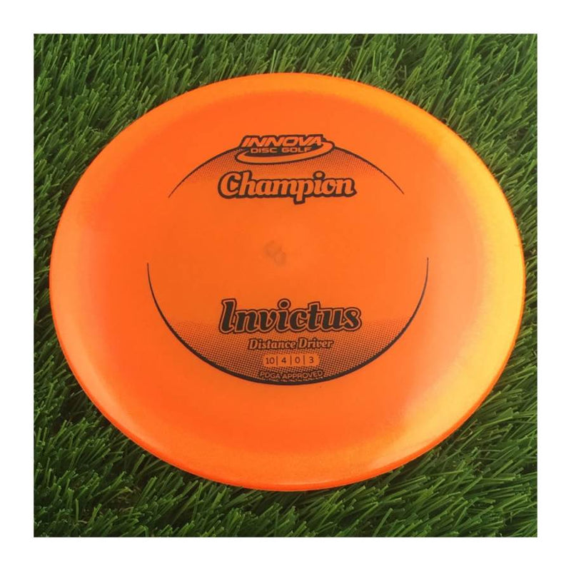 Innova Champion Invictus with Circle Fade Stock Stamp - 172g - Translucent Orange