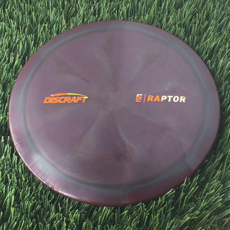 Discraft Elite Z Swirl Raptor with Ezra Aderhold - EZ Small Logo Stamp - 174g - Translucent Dark Purple