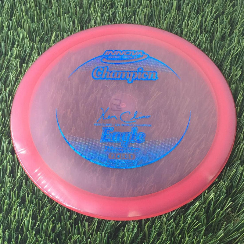 Innova Champion Eagle with Ken Climo - 12x World Champion New Stamp Stamp - 147g - Translucent Red