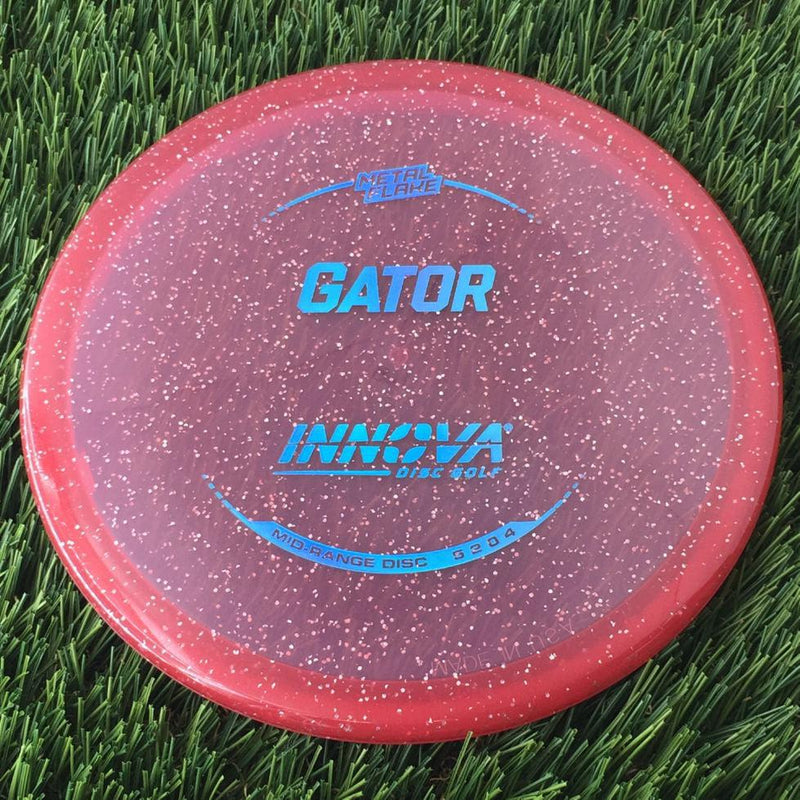 Innova Champion Metal Flake Gator with Burst Logo Stock Stamp - 168g - Translucent Red
