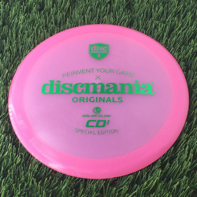 Discmania C-Line Color Glow Reinvented CD1 with Discmania Originals x Reinvent Your Game Special Edition Stamp - 174g - Translucent Pink