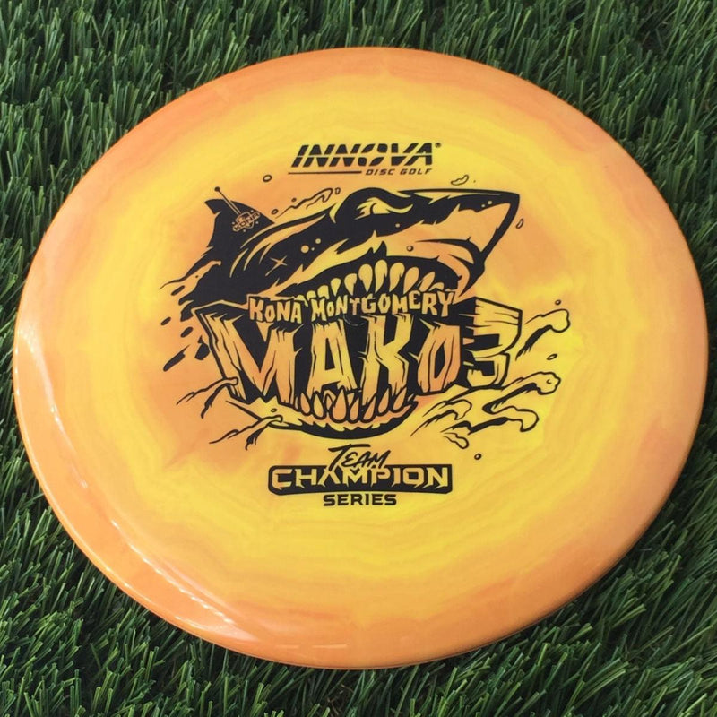 Innova Star Mako3 with Kona Montgomery Team Champion Series 2025 Stamp- 180 Orange