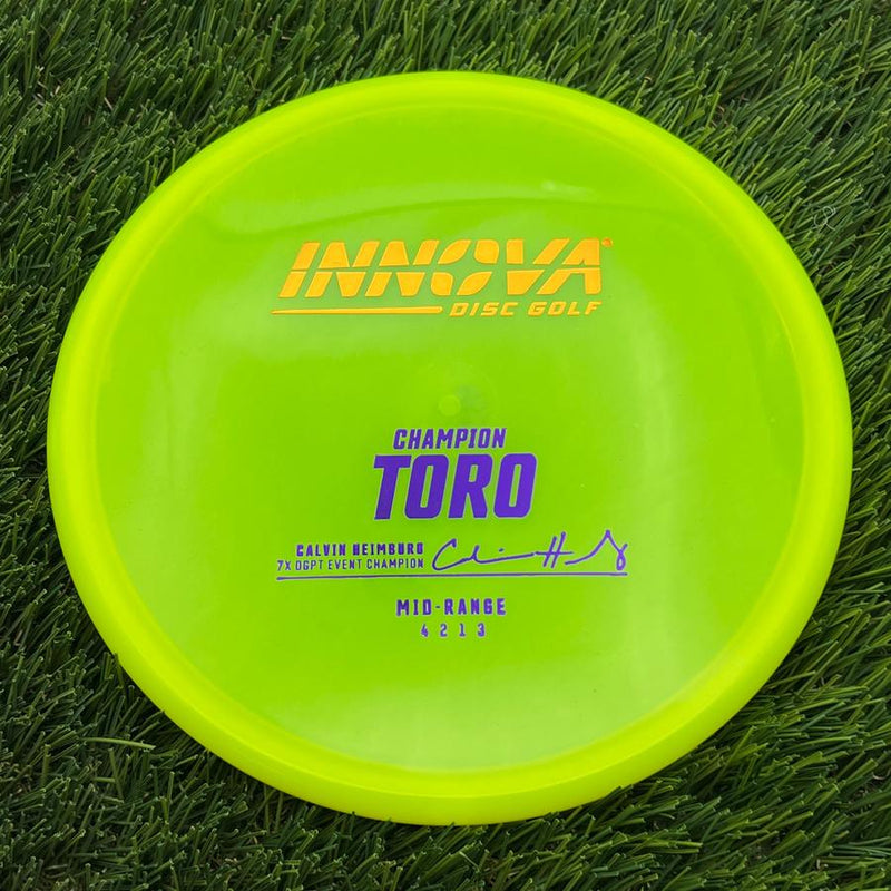 Innova Champion Toro with Calvin Heimburg - 9X DGPT Event Champion Signature Stamp- 174.5 Yellow