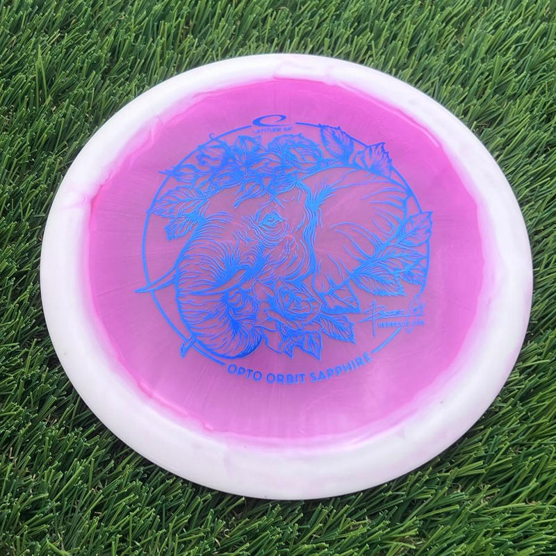 Latitude 64 Opto Ice Orbit Sapphire with Rebecca Cox Team Series 2025 Stamp- 162.9 Pink