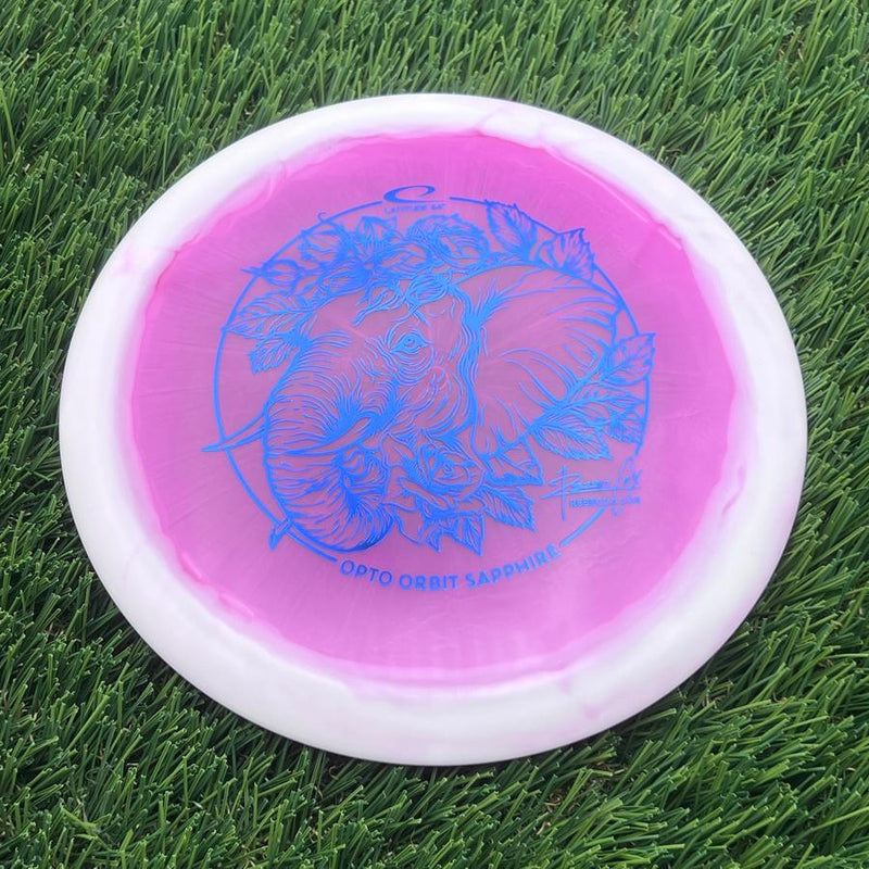 Latitude 64 Opto Ice Orbit Sapphire with Rebecca Cox Team Series 2025 Stamp- 162.64 Pink