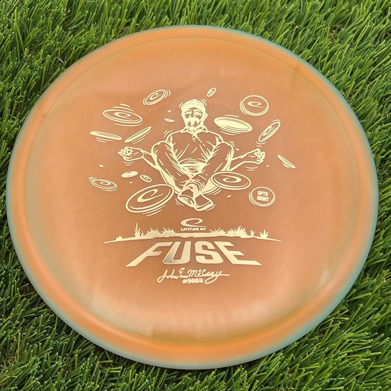 Latitude 64 Opto Ice Orbit Fuse with JohnE McCray Team Series 2025 Stamp- 179.1 Orange