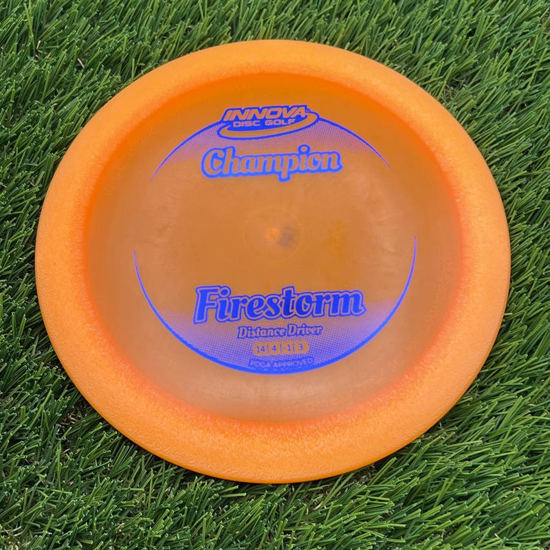Innova Champion Firestorm with Circle Fade Stock Stamp- 148.19 Orange