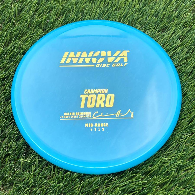 Innova Champion Toro with Calvin Heimburg 7X DGPT Event Champion Stamp- 169.05 Blue