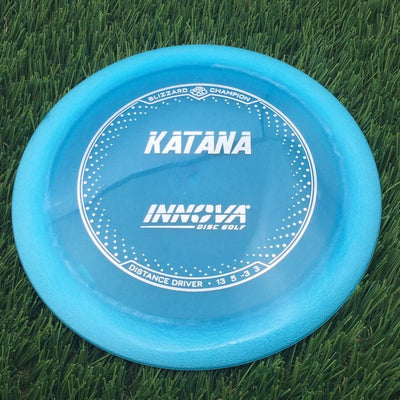Innova Champion Blizzard Katana with Burst Logo Stock Stamp- 159.29 Blue