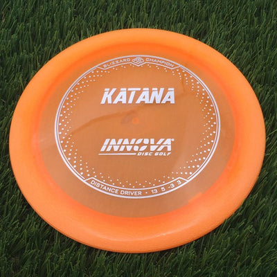 Innova Champion Blizzard Katana with Burst Logo Stock Stamp- 159.39 Orange