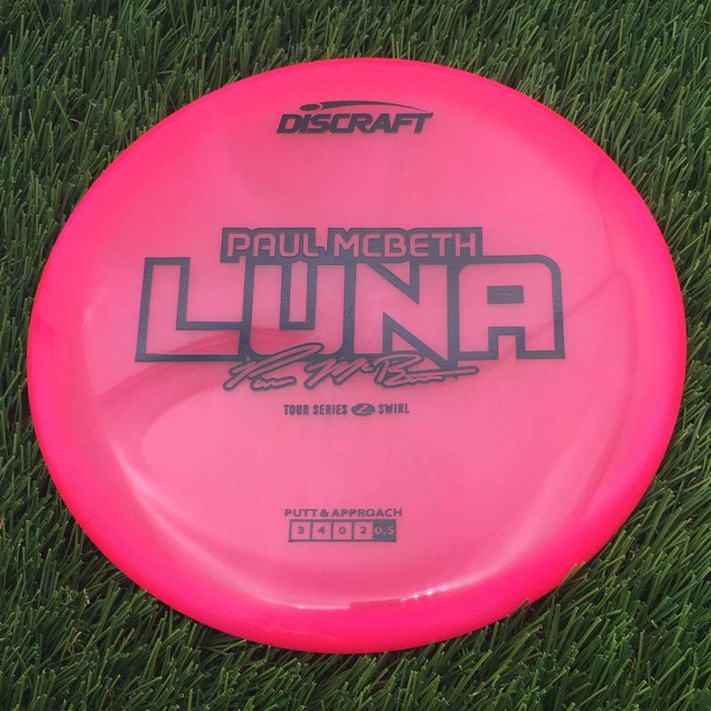Discraft Elite Z Swirl Luna with Paul McBeth 2025 Tour Series Stamp- 174.32 Pink