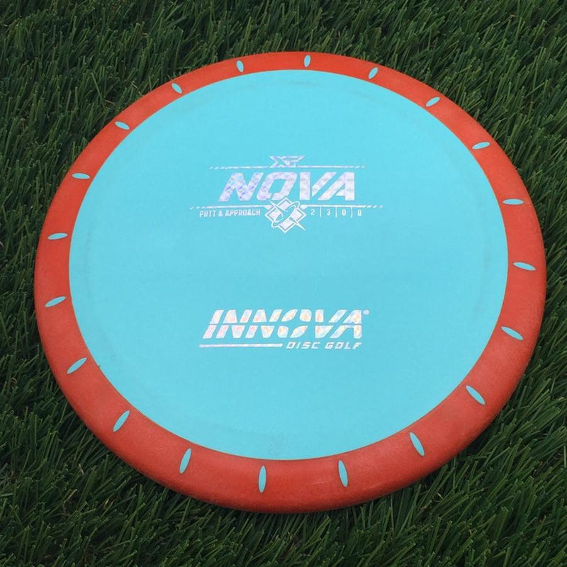 Innova Overmold XT Nova with Burst Logo Stock Stamp- 168.94 Blue