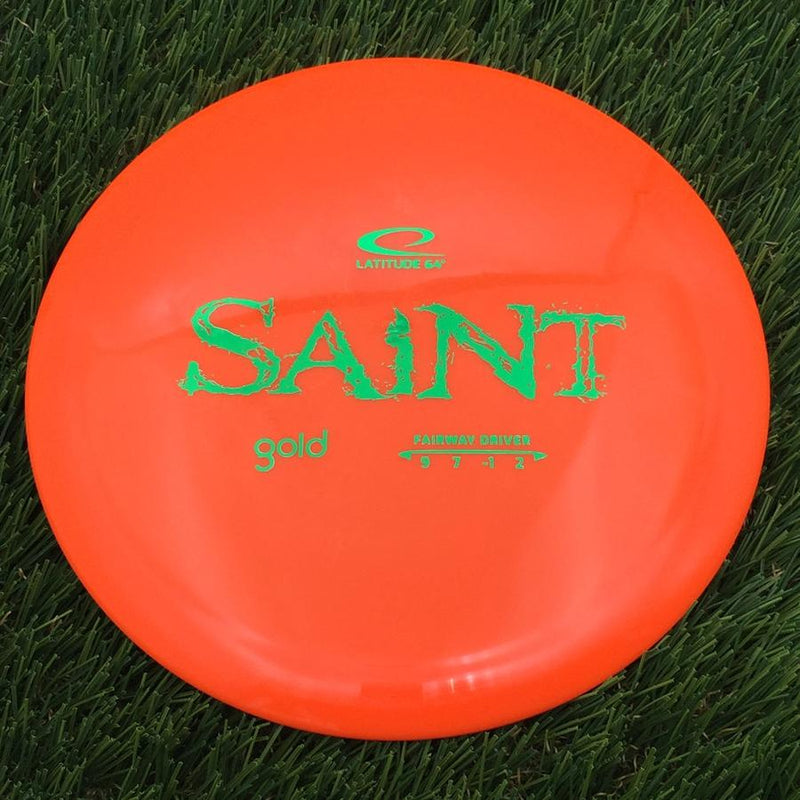 Latitude 64 Gold Line Saint with Distressed Stock Stamp- 170.76 Orange