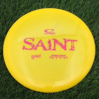 Latitude 64 Gold Line Saint with Distressed Stock Stamp- 175.08 Yellow