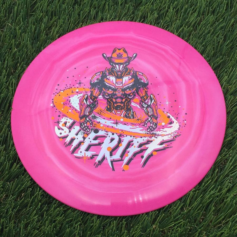Dynamic Discs Fuzion Swirl Sheriff with Galactic Lawman Stamp- 175.54 Pink