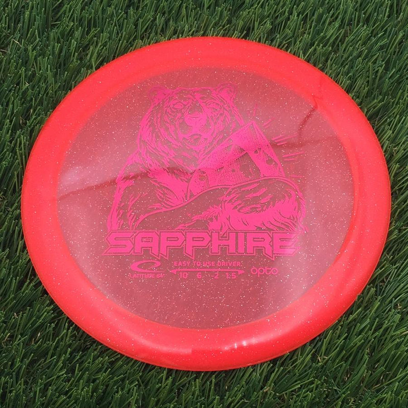 Latitude 64 Opto Sapphire with Stock Character Stamp- 160.61 Pink