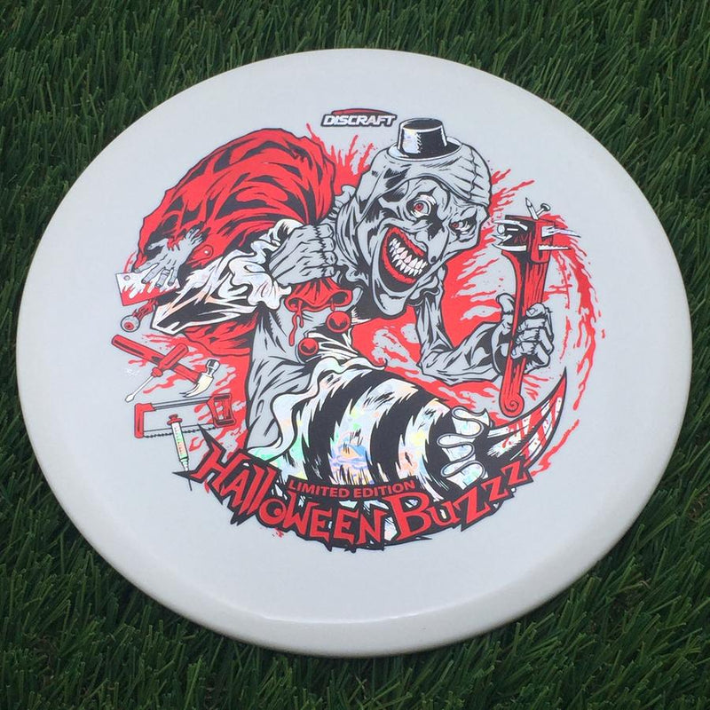 Discraft Seasonal Glow Elite Z Buzzz with 2025 Tri-Foil Hot Stamp Halloween Art by Brian Allen Stamp- 179.07 White
