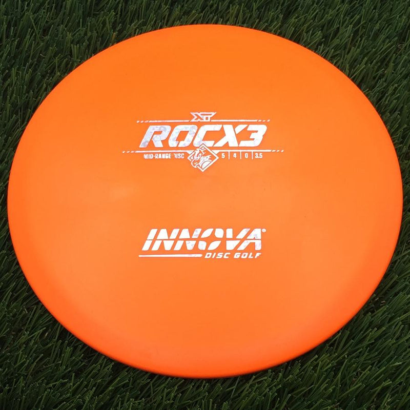 Innova XT RocX3 with Burst Logo Stock Stamp- 176.89 Orange