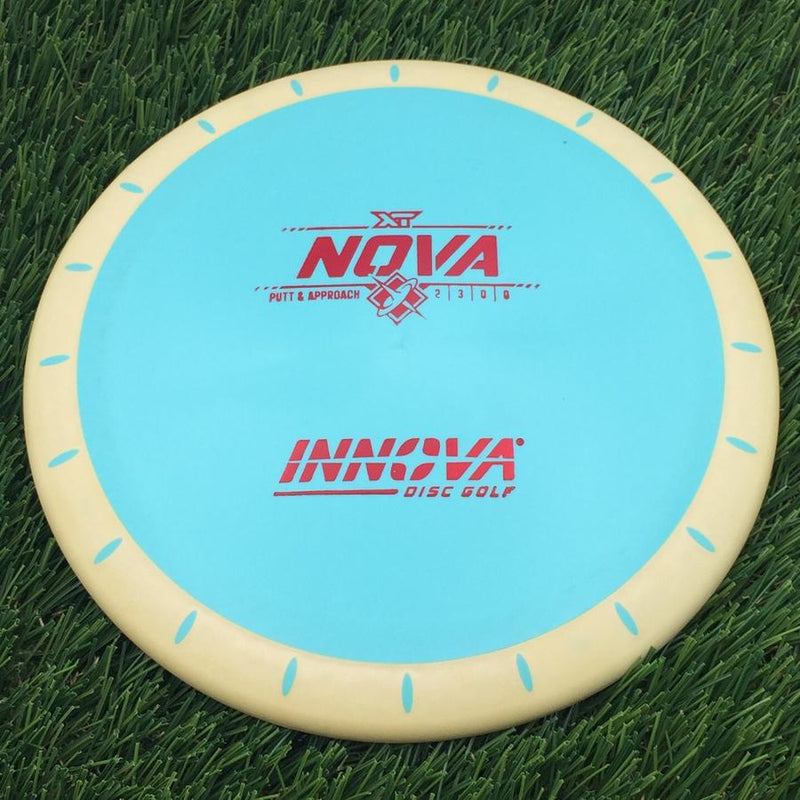Innova Overmold XT Nova with Burst Logo Stock Stamp- 172.98 Blue