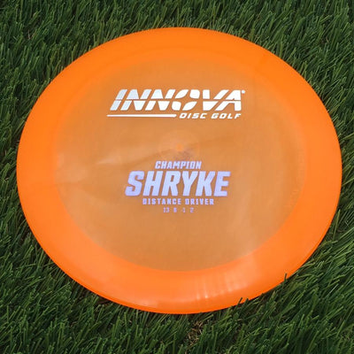 Innova Champion Champion Shryke with Burst Logo Stock Stamp- 172.54 Orange