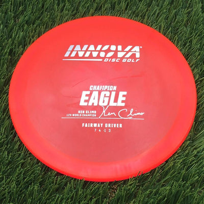 Innova Champion Eagle with Ken Climo 12X World Champion Signature Burst Logo Stock Stamp- 169.78 Pink