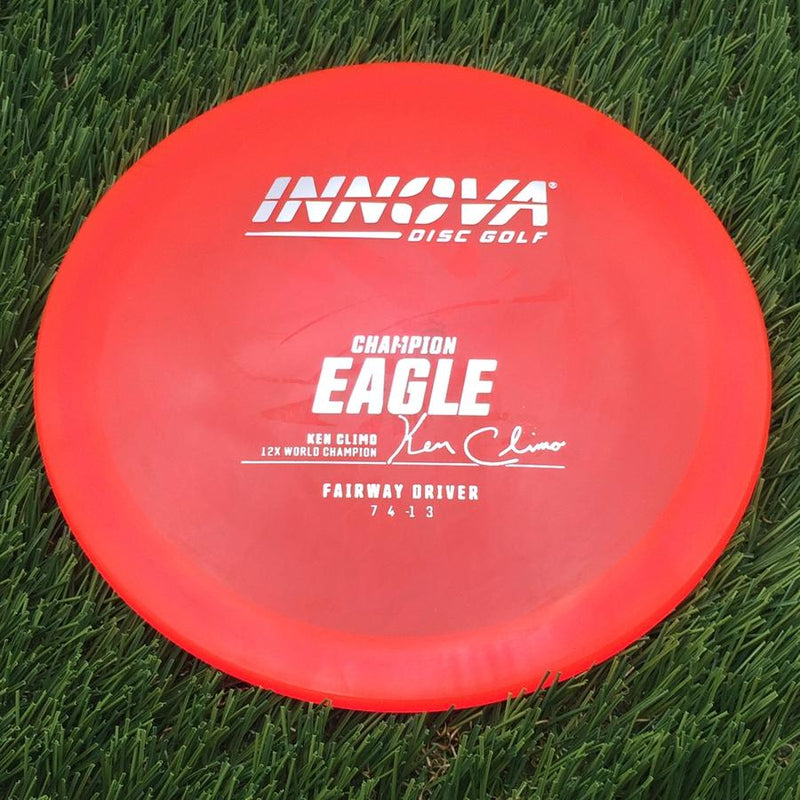Innova Champion Eagle with Ken Climo 12X World Champion Signature Burst Logo Stock Stamp- 169.78 Pink