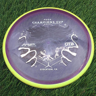 Axiom Particle Glow Proton Hex 5|5.5|-1|1 with OTB Champions Cup 2025 - Wizardcraft by Mike Inscho Stamp - 177.0g - Yellow Rim Purple - Yellow Rim Purple / 177g