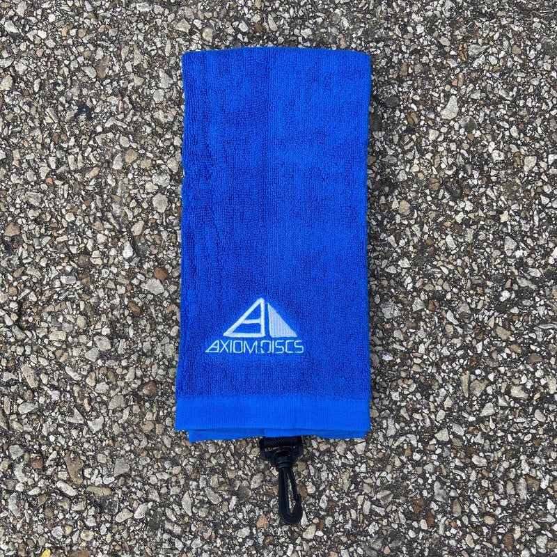 Blue Axiom tri-fold icon logo towel with a black plastic carabiner clip attached to the bottom.