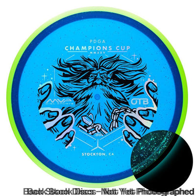Blue Axiom Proton Hex disc golf disc with a bright green outer rim and black Wizardcraft graphic by Mike Inscho.