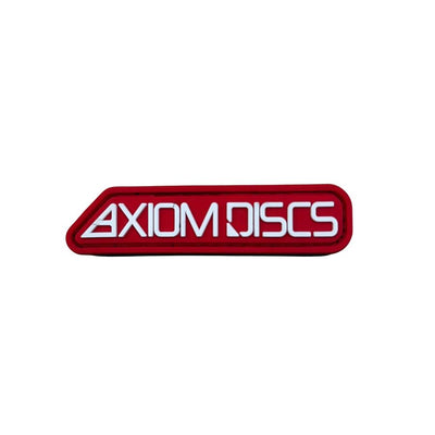 Red rubberized PVC Axiom black bar logo hook and loop patch with white embossed letters.