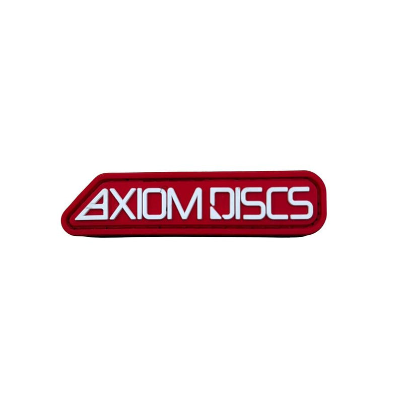Red rubberized PVC Axiom black bar logo hook and loop patch with white embossed letters.