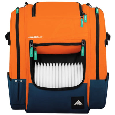Axiom voyager lite disc golf backpack in orange and navy blue, showing an open compartment with white discs.