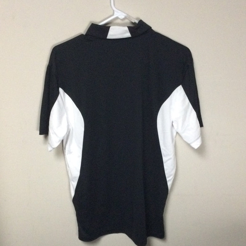 Back of a black mvp orbit logo polo with white side panels and a white collar accent, hanging on a hanger.
