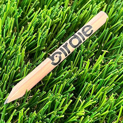 Light brown wooden Birdie score-keeping pencil with a black "birdie" logo and a sharpened tip.