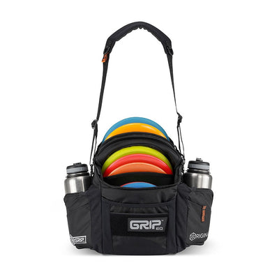 Black grip eq g2 series disc golf bag with a padded shoulder strap, full of colorful discs, and two stainless steel water.