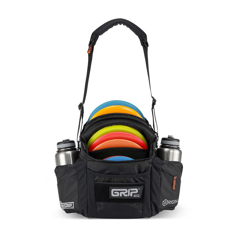 Black grip eq g2 series disc golf bag with a padded shoulder strap, full of colorful discs, and two stainless steel water.