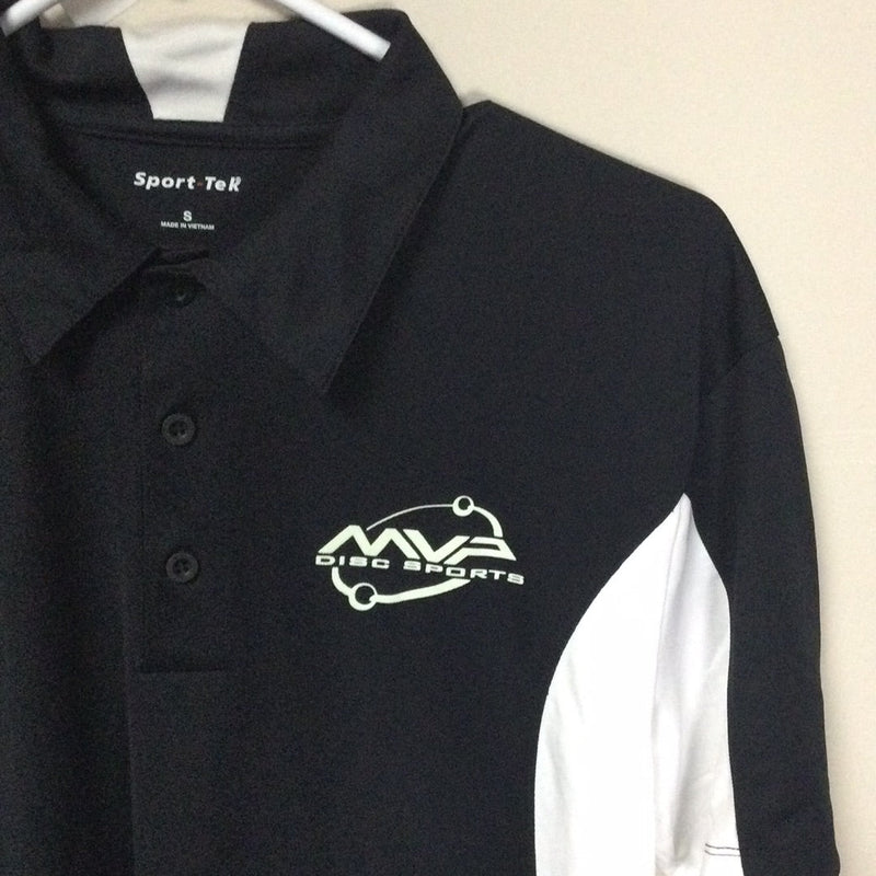 Black "sport-tek" polo with white side panel and mvp disc sports orbit logo.