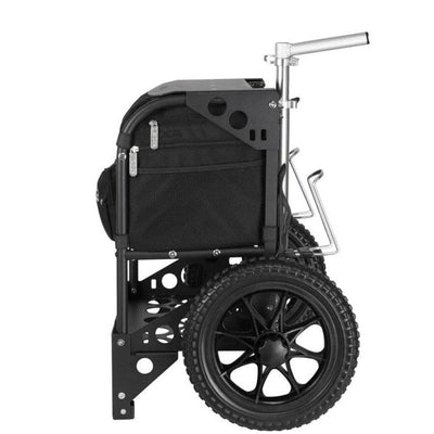 Black zuca transit cart with ribbed wheels, a gray frame, mesh pockets, and a metallic handle on a white background.