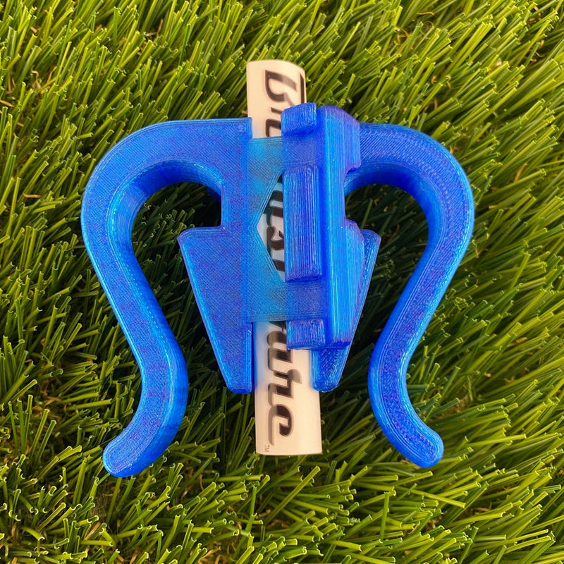 Blue Briggisware ZUCA Cart double putter holder made of textured 3D printed plastic with a white marker inserted.