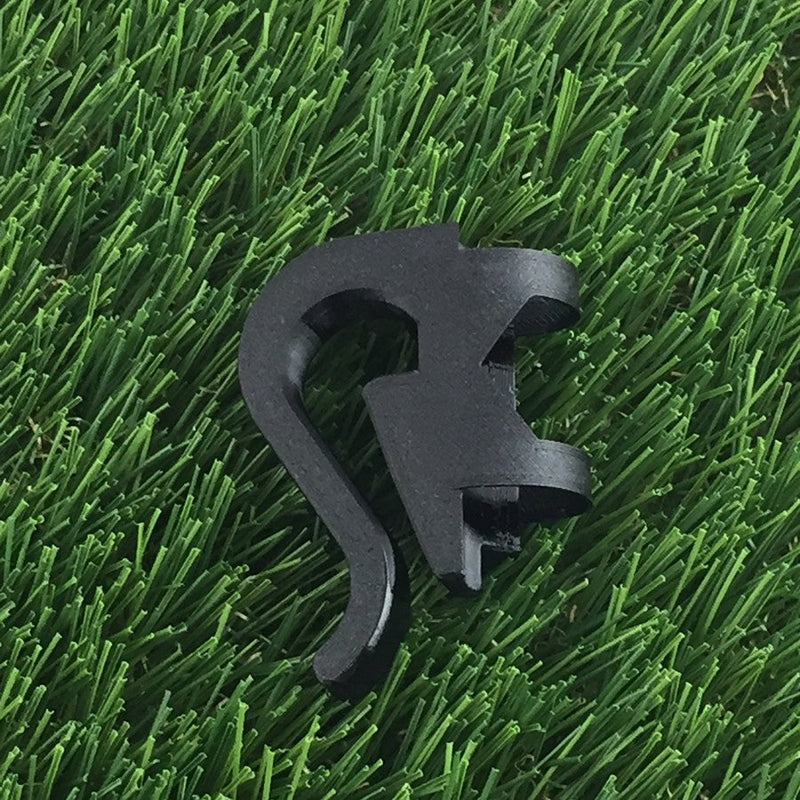 Briggisware Zuca Cart single putter holder, a black plastic clip with curved sections for gripping a disc.