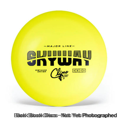 Bright yellow Major Line Skyway Distance Driver disc golf disc with black "Skyway" lettering and "Climo First Run" stamp.
